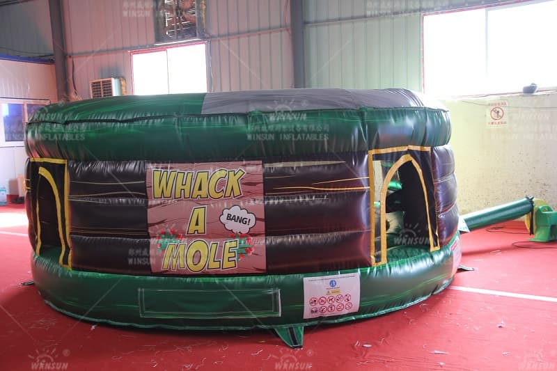 Whack-a-mole humano inflable